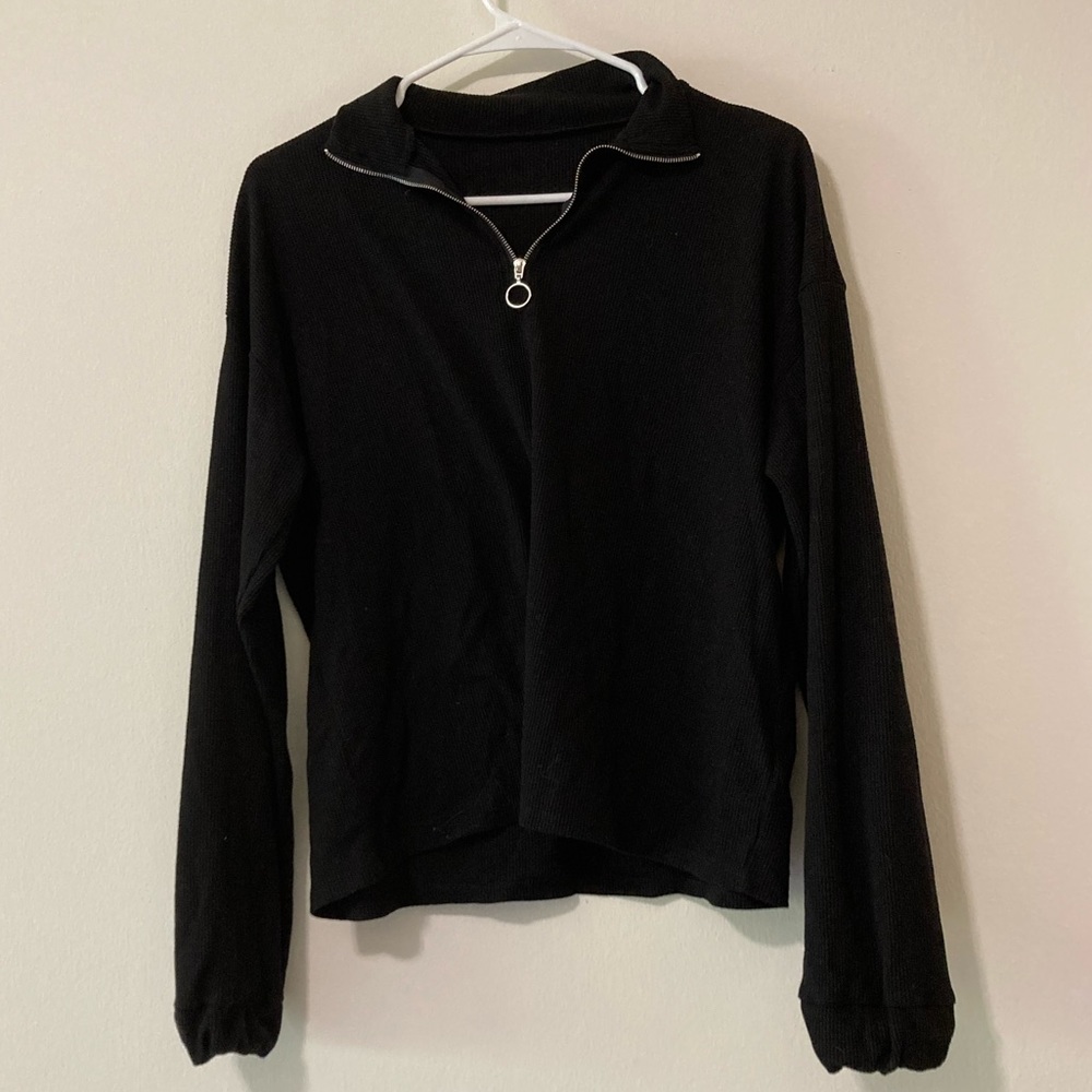 no tag, black sweater, very comfy and stretchy, not a flimsy material though